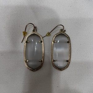 Kendra Scott earrings.
